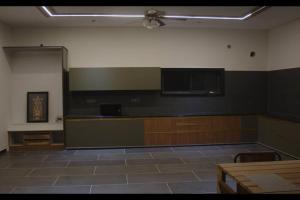 an empty room with a large room with a ceiling at Arr farm stay in Shamshabad