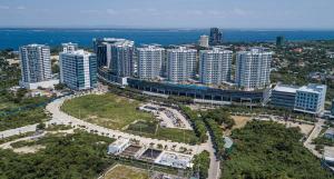 an aerial view of a city with tall buildings at Mactan Newtown Beach Condo in Lapu Lapu City