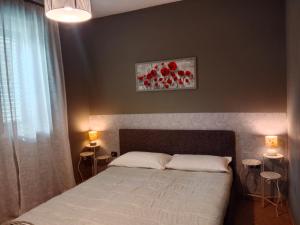 A bed or beds in a room at Odori di zagara