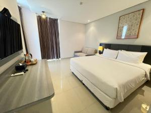 Arrayan Hotel Malioboro電視和／或娛樂中心