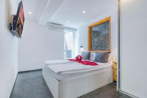 a bedroom with a bed and a window at Casa al Mar in Maspalomas +39 photos