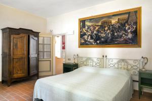 Postel nebo postele na pokoji v ubytování Agriturismo Pratofranco