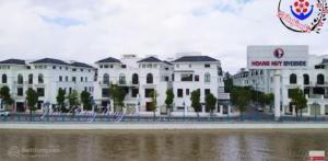 a group of white buildings next to a body of water at HPT Home II Hoàng Huy Riverside Apartment - Homestay chuỗi căn hộ Hải Phòng in Hai Phong