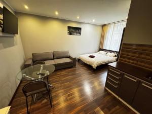 Postel nebo postele na pokoji v ubytování ApartHotel Riga