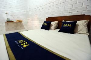 Postel nebo postele na pokoji v ubytování Katumbiri Resort