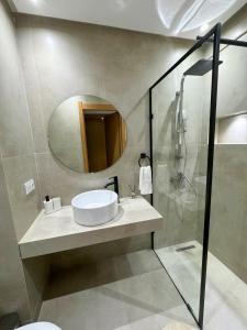 Koupelna v ubytování Lyana Home + 16 fotografií