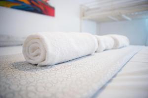 Posteľ alebo postele v izbe v ubytovaní Enjoy Apartment Gorla