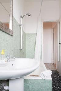 Kúpeľňa v ubytovaní Enjoy Apartment Gorla
