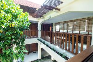 Balkón nebo terasa v ubytování De Hostel Yogyakarta + 26 fotografií