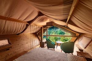 Postel nebo postele na pokoji v ubytování Delle Rose Camping & Glamping Village + 37 fotografií