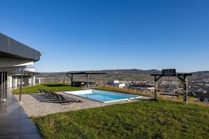 Bazén v ubytování Panorama Residence nebo v jeho okolí