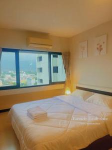 Ένα ή περισσότερα κρεβάτια σε δωμάτιο στο 2BR Charming Family Suite +19 φωτογραφίες