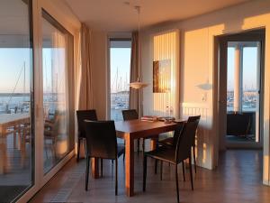 Posezení v ubytování Ferienwohnung Austernfischer Marina Wendtorf + 31 fotografií