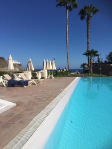 Bazén v ubytování BLUE PEARL - POOL - TERRACE - OCEAN VIEW - BEACH - WIFI - WONDERFUL Complex - FREE DIGITAL TRAVEL GUIDE nebo v jeho okolí