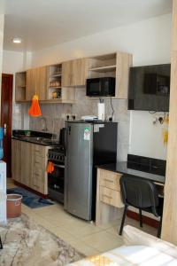 Kuchyň nebo kuchyňský kout v ubytování South suites