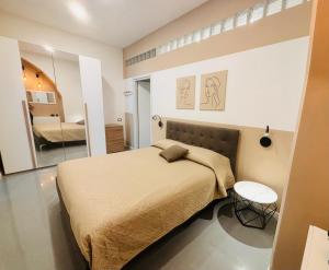 Postel nebo postele na pokoji v ubytování Casa F. I.