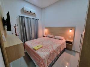 Postel nebo postele na pokoji v ubytování Hotel Karanda´y