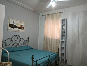 Postel nebo postele na pokoji v ubytování La casetta del maggiore + 9 fotografií