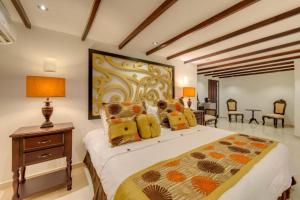 Postel nebo postele na pokoji v ubytování Hotel Dorado Plaza Boutique Calle del Arsenal
