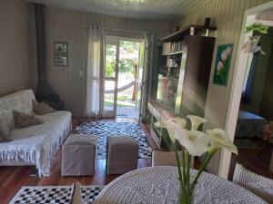 Khu vực ghế ngồi tại Casa Alpes Verdes Canela RS