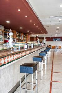 Reštaurácia alebo iné gastronomické zariadenie v ubytovaní Zenit Logroño
