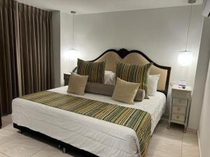 Postel nebo postele na pokoji v ubytování Hotel Dorado Plaza Boutique Calle del Arsenal