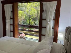 Katil atau katil-katil dalam bilik di Lindo APTO no Centro Capivari - Condomínio Privado