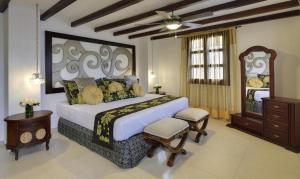 Postel nebo postele na pokoji v ubytování Hotel Dorado Plaza Boutique Calle del Arsenal