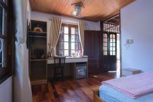 Ένα ή περισσότερα κρεβάτια σε δωμάτιο στο Bavi Homestead