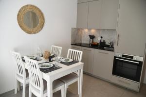 Köök või kööginurk majutusasutuses Charming studio with terrace 5 minutes from Murten