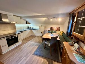 Kuchyň nebo kuchyňský kout v ubytování Appartement Maximilian