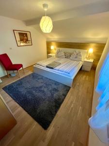 Postel nebo postele na pokoji v ubytování Appartement Maximilian