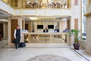 a man standing in the lobby of a hotel at Antea Hotel Oldcity -Special Category in Istanbul