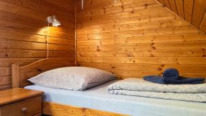 A bed or beds in a room at Chata u Porubäna