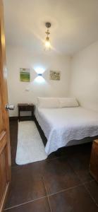 Un ou plusieurs lits dans un hébergement de l'établissement HOSTAL LA MODERNA