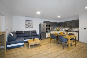 Kuchyň nebo kuchyňský kout v ubytování Apartmány U Betléma