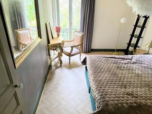 Posteľ alebo postele v izbe v ubytovaní Maison au château
