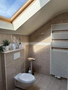 Koupelna v ubytování Vakantiewoning dichtbij zee + 22 fotografií