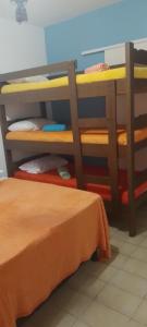 Postel nebo postele na pokoji v ubytování Pousada Boneca de Pano