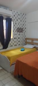 Postel nebo postele na pokoji v ubytování Pousada Boneca de Pano