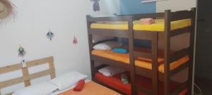 Postel nebo postele na pokoji v ubytování Pousada Boneca de Pano