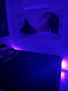 En eller flere senge i et værelse på Au 69 du Village Naturiste + 4 billeder