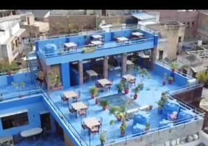 an overhead view of a blue building with a pool at Gopal Home Stay & Guest House in Jodhpur