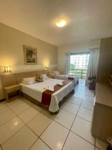 Postel nebo postele na pokoji v ubytování Hotel La Brise + 38 fotografií