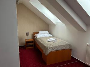 Hotel Evan u Hoffera客房内的一张或多张床位
