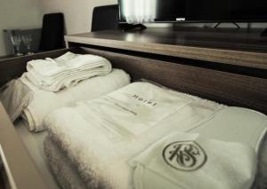 Voodi või voodid majutusasutuse Hotel Season toas