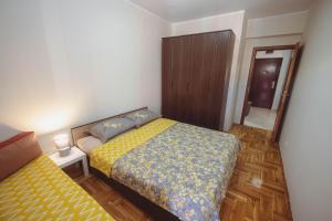 Postel nebo postele na pokoji v ubytování Anika apartment