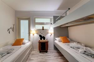 Postel nebo postele na pokoji v ubytování B&B Apartments Coli apartments Afrodita & Antonia