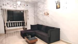 Istumisnurk majutusasutuses Cozy 1BHK Candolim beachgoa