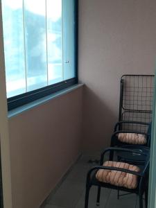 A seating area at APARTMAN VIAGGIO i PARKING GARAŽA